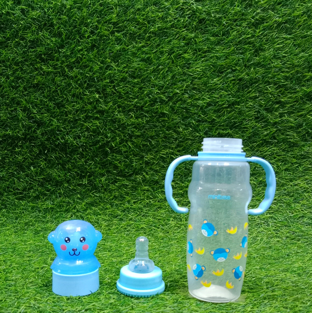 Baby Feeder Of Minitree Brand In White Color And Lid In Purple Color